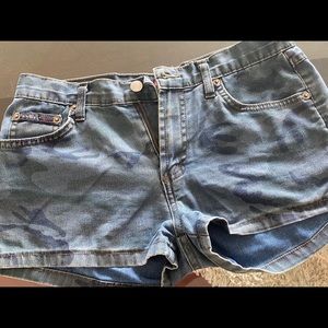 Blue camo denim shorts